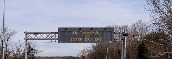 electronic highway sign with Be Thankful for Sober Drivers message