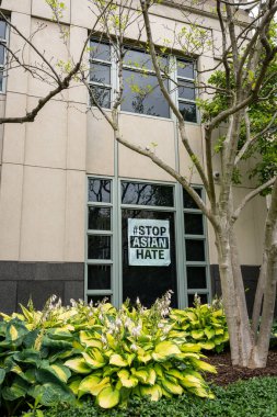 Washington DC - June 27, 2022: Sign in a window says 