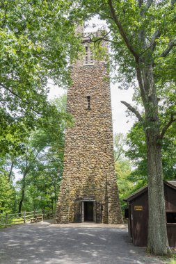 Bowman's Hill Tower in Washington Crossing, PA built in 1929-31 of local field stone stands 125 ft tall. At the top of the tower you can see 14 miles of the surrounding countryside and Delaware river. clipart