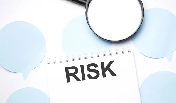 White Noteapad Magnifier Blue Speech Bubles Text Risk Business Concept — Stock Photo, Image