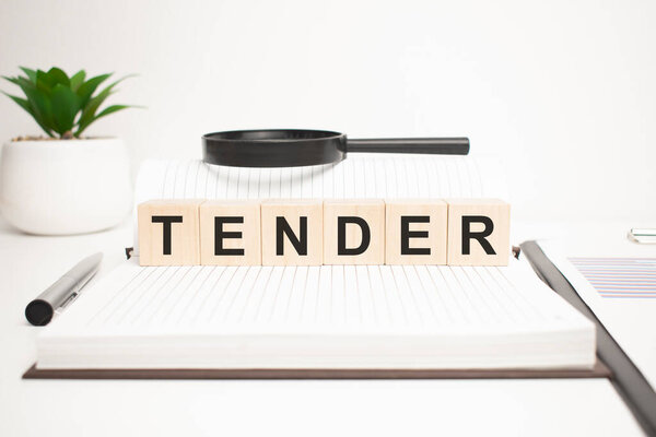 Концепция нежного слова. деревянные кубики, блокнот, ручка и бизнес-карты.