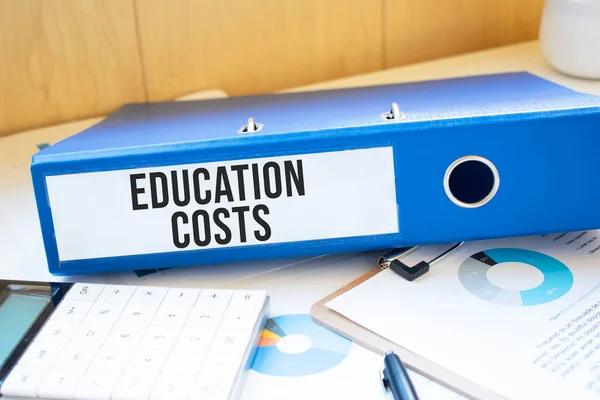 EDUCATION COSTS words on labels with document binders