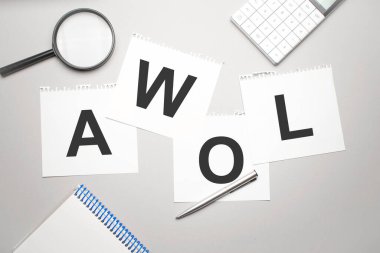 Awol metin ile büyüteç, hesap makinesi, kalem ve kağıt sayfası