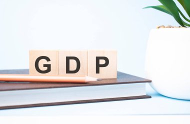 Yapı taşları üzerindeki gdp kısaltması iki farklı boyutta kalem tarafından desteklenmektedir. Boşluğu kopyala.
