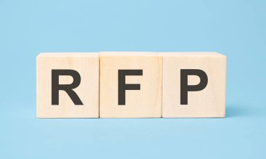 rfp word written on wooden cubes with copy space