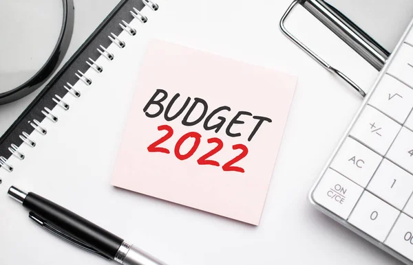 Budget 2022 Notepad Eyeglasses White Pen Financial Concept — Zdjęcie stockowe
