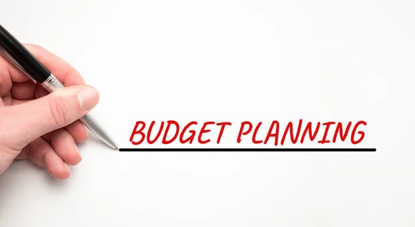 用红色标记手工写预算计划 被白色背景隔离 业务概念 — 图库照片
