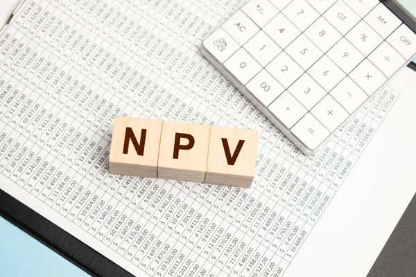 Nettonuvärde Npv Ord Komponerat Träkuber Med Miniräknare — Stockfoto