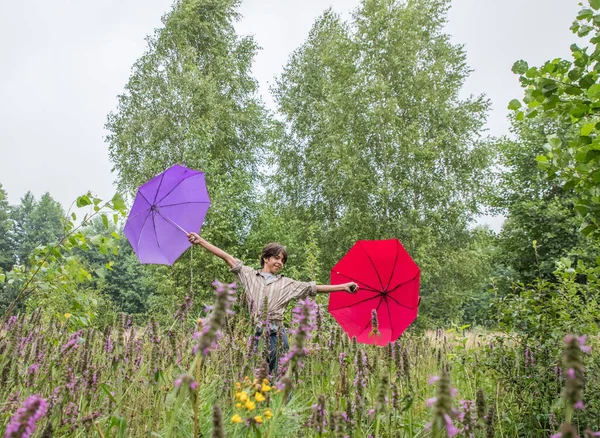 Young Man Two Umbrellas — Stock Photo, Image