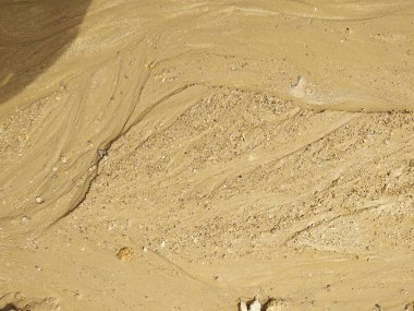 Yağmurdan sonra kil ve kum dokusu. Yakın plan..