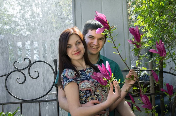 Portrait Beautiful Young Couple Magnolia Flowers — 스톡 사진