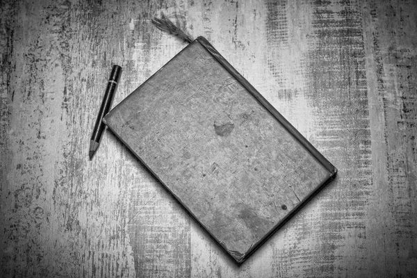 Black White Table Top Photo Old Heavily Used Closed Sketchbook — Stock Photo, Image