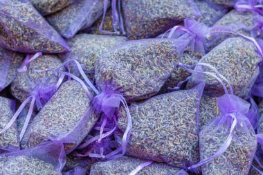 Some sachets with dried lavender flowers as room scent at a sales stand