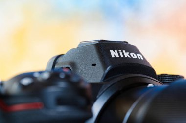Berlin, Germany - February 21, 2022: View to the brand name of a camera with unfocussed elements in the foreground.