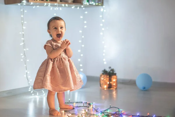 Little Girl Play Christmas Lights — Stock Photo, Image