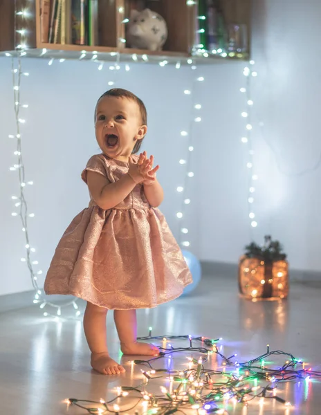 Little Girl Play Christmas Lights — Stock Photo, Image