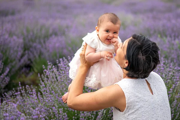 Happy Mother Pretty Daughter Lavender Background — Stock Photo, Image