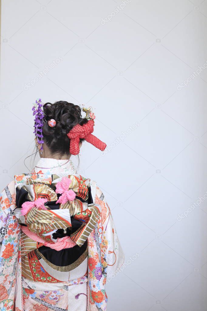 Japanese girl on Seven-Five-Three festival ( from behind white back) (7 years old)