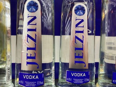 Viersen, Germany - December 9. 2021: Closeup of bottles with logo lettering of jelzin vodka in shelf of german supermarket