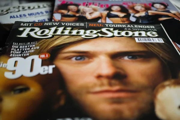 Viersen, Germany - May 9. 2021: Closeup of rolling stone paper print music magazine cover with story about nirvana singer kurt cobain
