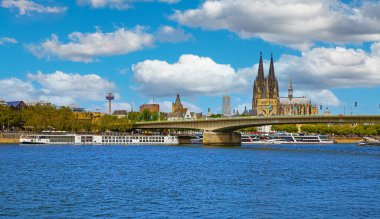Cologne, Germany - July 9. 2022: View over river rhine on Deutzer bridge, skyline with dom and tv tower