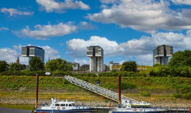 Cologne, Germany - July 9. 2022: View from Deutzer Hafen on modern Kranhaus buildings in Rheinauhafen