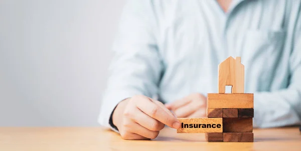 Businessman Pull Out Wooden Block Which Print Screen Insurance Wording — Stock Photo, Image