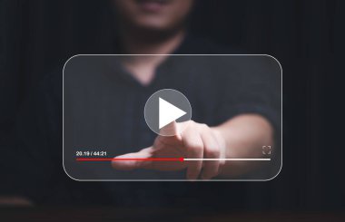 Man hand touching and watching for live streaming for Video streaming on internet and multimedia technology concept.