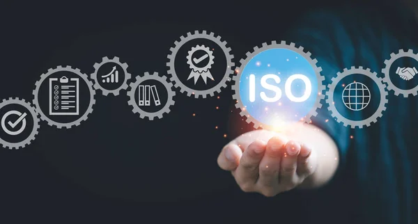 Businessman Hand Holding Virtual Iso Wording Quality Standard Icon Company — Stock fotografie