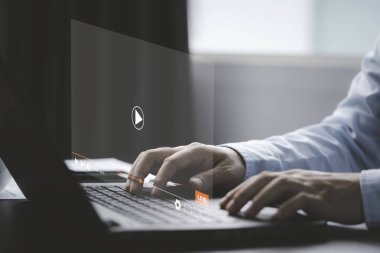 Man use laptop computer to watching and live streaming window for Video streaming on internet and multimedia technology concept.