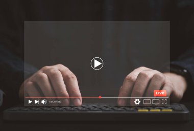 Man use laptop computer to watching and live streaming window for Video streaming on internet and multimedia technology concept.