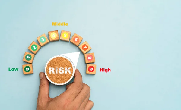 Investor Hand Turning Risk Button Low High Position Risk Management — Foto de Stock