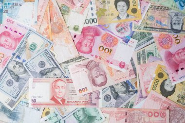 Çeşitli uluslararası banknotların düz dizaynı arasında döviz kurları için Dolar Yuan Baht Won ve öncül ticaret kavramı yer almaktadır..