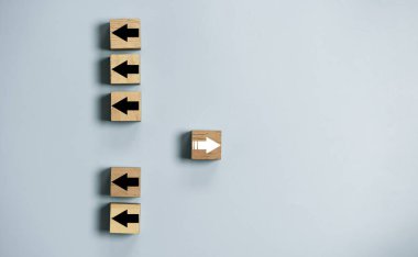 White arrow move out from different direction from many black arrow for business and technology disruption concept.