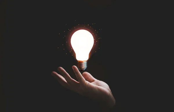 Hand Holding Glowing Lightbulb Creative Thinking Innovation Idea Problem Solving — Zdjęcie stockowe