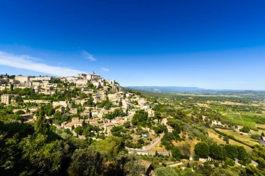 Village of Gordes in Luberon land in France clipart