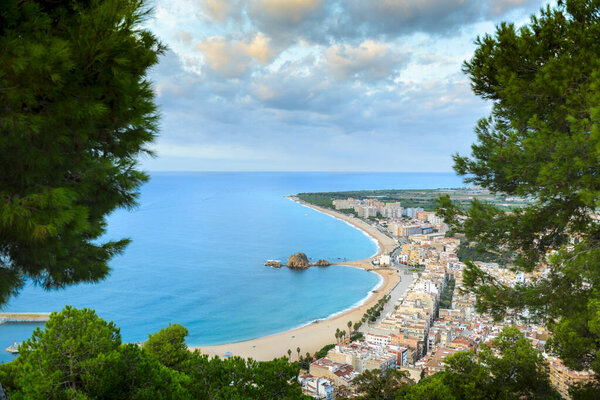 Beach and coast of Blanes city seen from Castell Sant Joan in Spain
