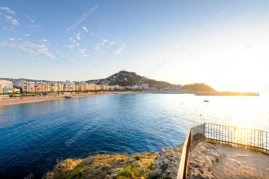 Blanes city and beach from Sa Palomera rock at morning in Spain
