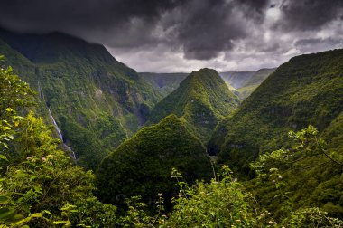 Landscape of Takamaka Valley during a cloudy day, Reunion Island clipart