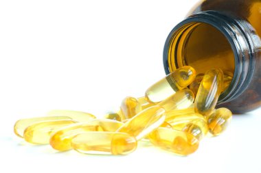 İyi yağlı balık yağı ve E vitamini takviyeleri, sağlık ve vücut.