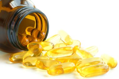 İyi yağlı balık yağı ve E vitamini takviyeleri, sağlık ve vücut.