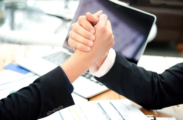 Shake hands of people working assemble corporate meeting show symbol Join forces teamwork quality and effective personnel Concept organizational development in teamwork and business