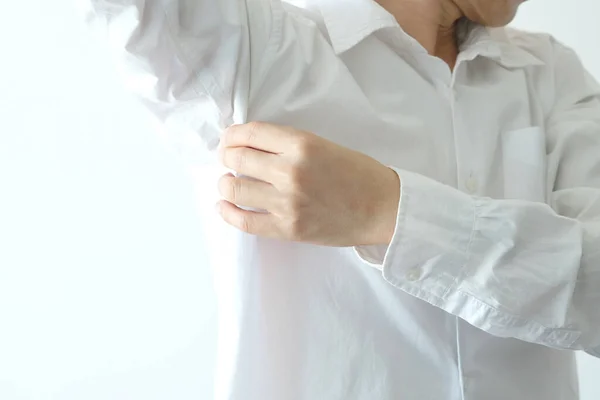 Men wear white sleeves, arms are covered with armpits, Sweat are unclean and unclean. Health care concept