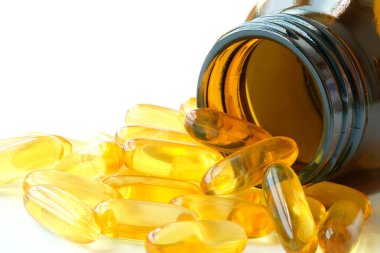 Yağlı balık yağı ve E vitamini takviyeleri, sağlık ve vücut. Sağlık ve tıbbi kavramlar