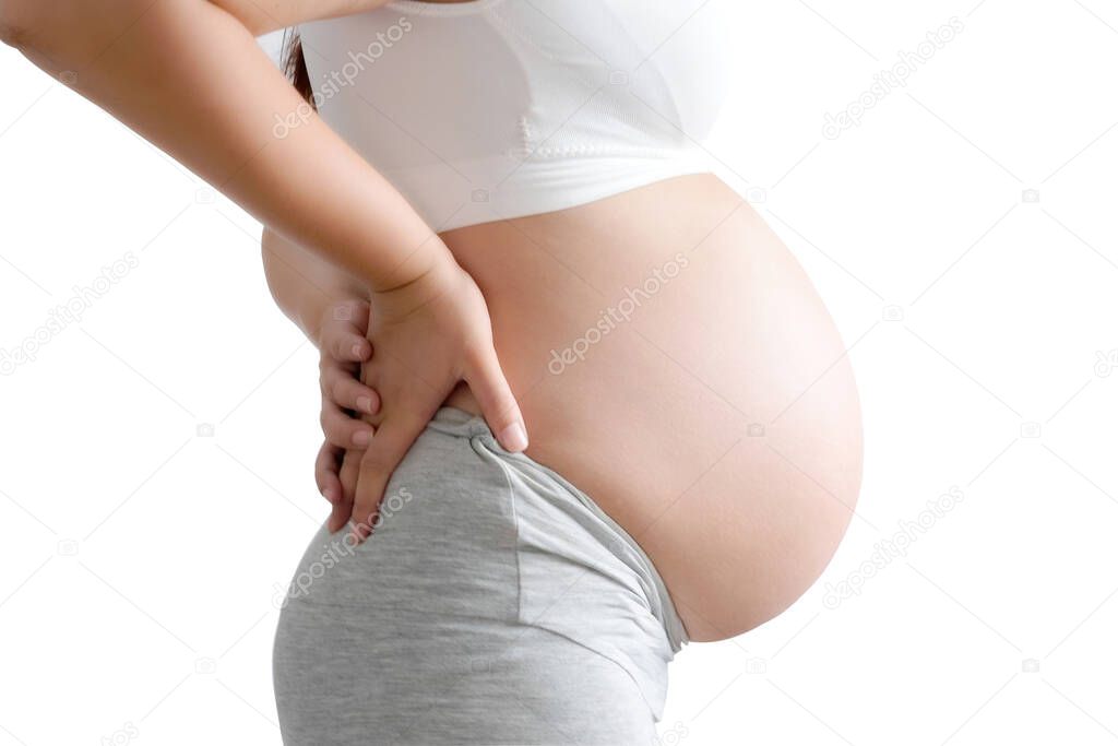 She have a baby. Woman is pregnant touching belly with love of mother and baby. Relationship during family concept , Health concept.