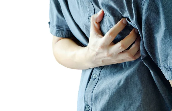 Heart attack, Man standing chest pain in the bedroom Health concept