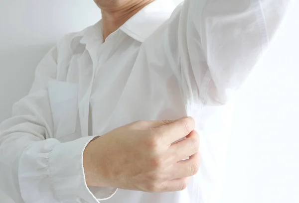 Men wear white sleeves, arms are covered with armpits, Sweat are unclean and unclean. Health care concept