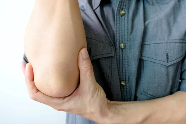 Männer Benutzen Ihre Hände Ihre Ellbogen Halten Und Hatte Schmerzen — Stockfoto