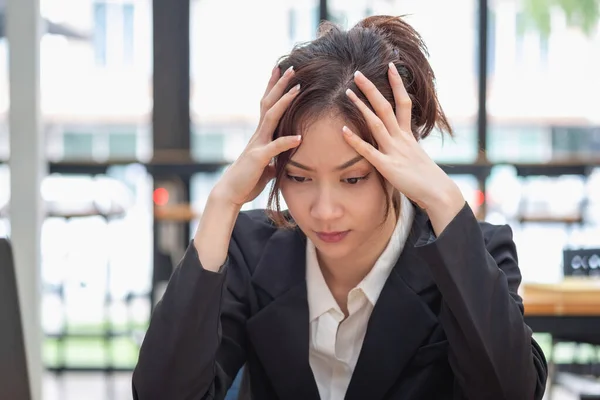 Burnout syndrome at work concept. exhausted overworked woman working in office.Concept Burnout Syndrome.