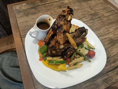 Truss if desired, and place the turkey into the roasting pan